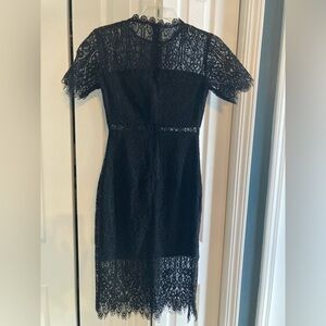 Francesca’s Collection’s Black Midi Lace Dress
